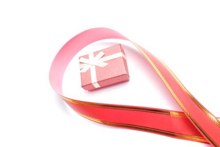 red ribbon and gift box on whiteの写真素材