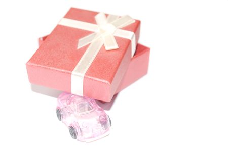 red gift and pink car. Closeupの写真素材