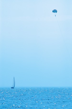 sea landscape with silhouette of a shipの写真素材