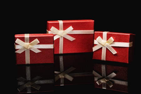 red gift boxes on black
