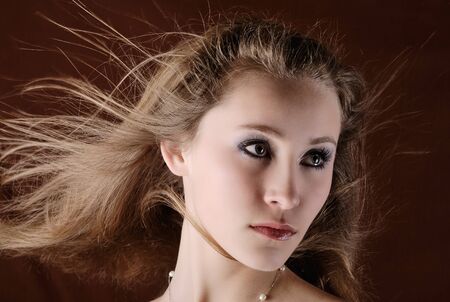 attractive girl with flowing hairの写真素材