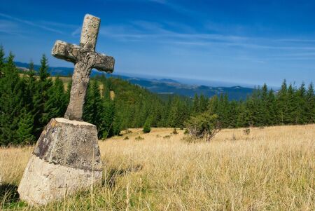 mountain landscape with old cross. natureの写真素材