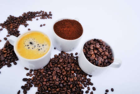 cups with coffee beans, blend and espresso. closeupの写真素材
