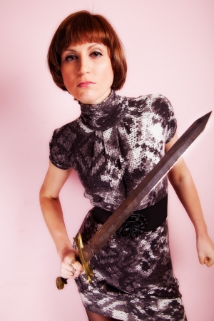 fatally woman with sword. indoor shotの写真素材