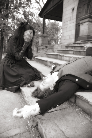 young widow in black dress and veilの写真素材