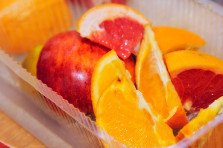 cutting fruits in box. prepared foodの写真素材