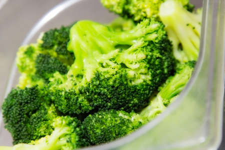 Steamed broccoli in a bowl closeupの写真素材