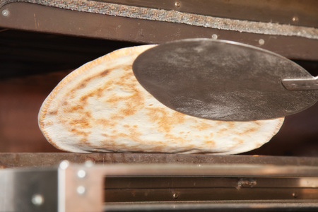 base for pizza in the ovenの写真素材