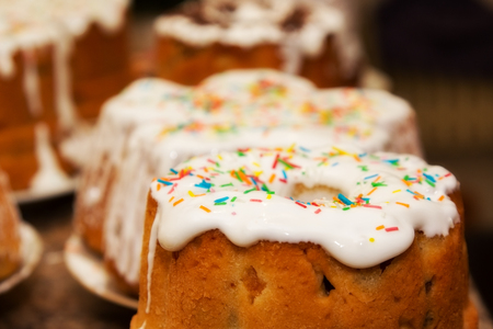 homemade Easter cake with icing and raisinsの写真素材
