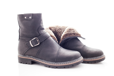 Men's winter boots with zipper and locking buckleの写真素材