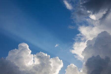 beautiful sky background with clouds and rays