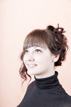 beautiful girl with interesting hair and a smileの写真素材