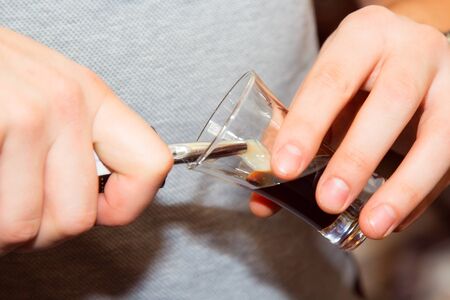 B-52 Preparation of three-layered drink. close-upの写真素材