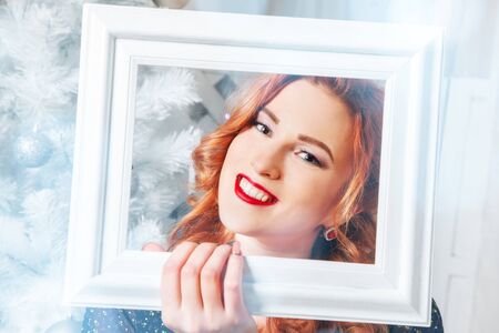 Portrait of a beautiful red-haired girl