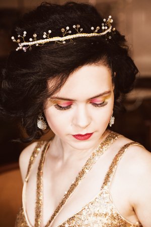 Portrait of attractive brown-haired woman indoorsの写真素材