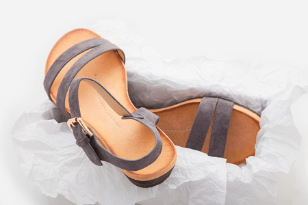 stylish, comfortable, grey women sandals on a white background
