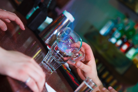 Preparation of exotic burning cocktails. Close-upの写真素材