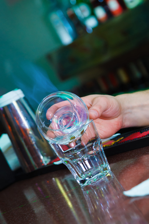 Preparation of exotic burning cocktails. Close-upの写真素材