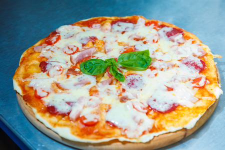pizza with seafood in tomato sauceの写真素材