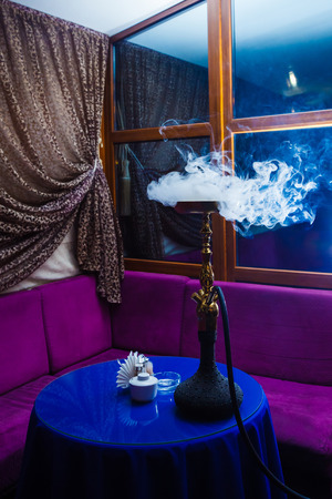 Beautiful smoke in the bowl of a hookah. close-upの写真素材