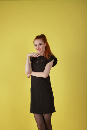 Portrait of an attractive, cute girl in the studio.の写真素材