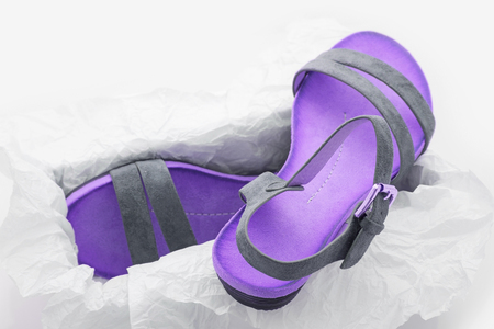 stylish, comfortable, violet women sandals on a white backgroundの写真素材
