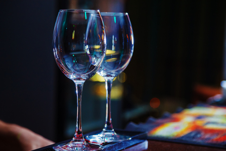 empty wine glasses on barの写真素材