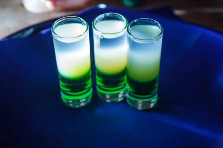 layer alcohol drink on bar. cocktailの写真素材