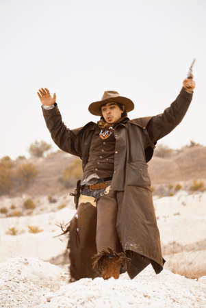 handsome man in cowboy clothesの写真素材