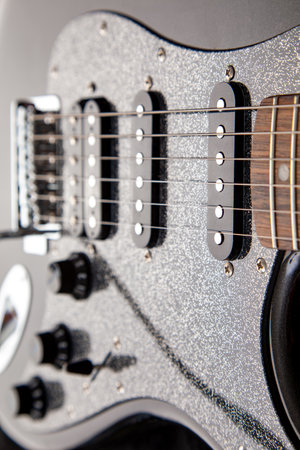 soundboard of an electric guitar close-up. shape of   humbucker and 2 singlesの写真素材