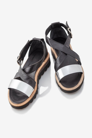 stylish, comfortable, women's sandals on a white backgroundの写真素材