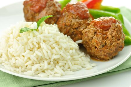 meat balls with rice and vegetables の写真素材