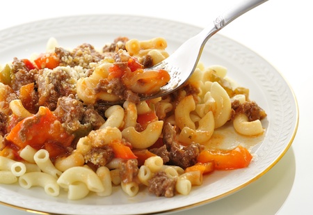 macaroni with sauce and vegetables の写真素材
