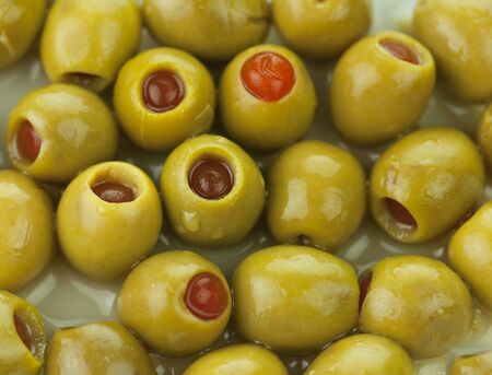 green stuffed olives ,close up for backgroundの写真素材