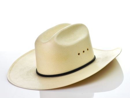 a vintage straw hat on white backgroundの写真素材