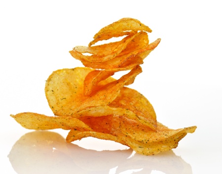 Pile of potato chips, close up shot の写真素材