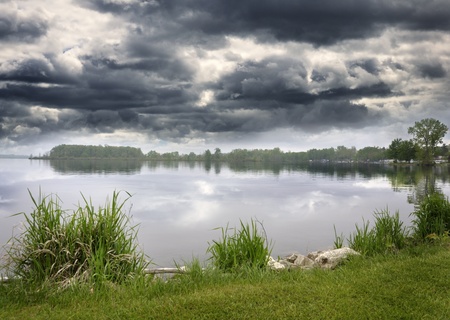 Summer Lake And Sky With Stormy Cloudsの写真素材