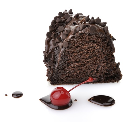 Gourmet Chocolate Cake with Chocolate Chips On White Background Gourmet Chocolate Cake with Chocolate Chips On White Background