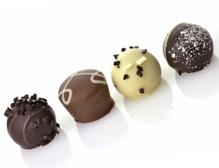 Delicious Chocolate Pralines ,Close Up,  On White Background 