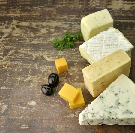 Assortment of Cheese On A Cutting Board