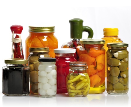 Glass Jars Of Preserved Fruits And Vegetablesの写真素材