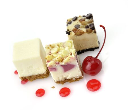 Cheesecake Slices On White Backgroundの写真素材