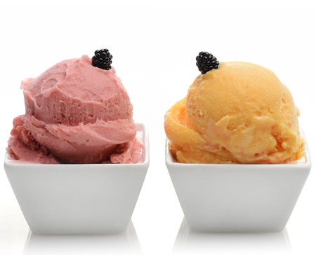 Orange And Strawberry Sorbet In The White Bowls