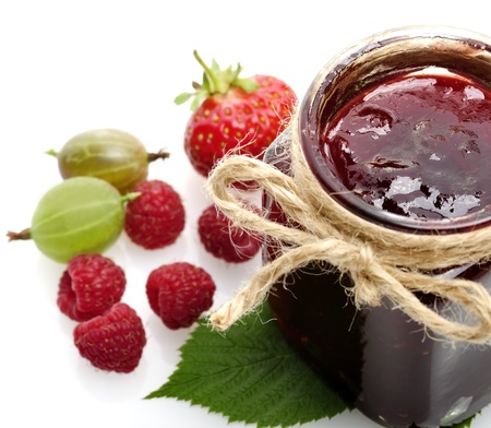 Glass Jar Of Jam And Fresh Berriesの写真素材