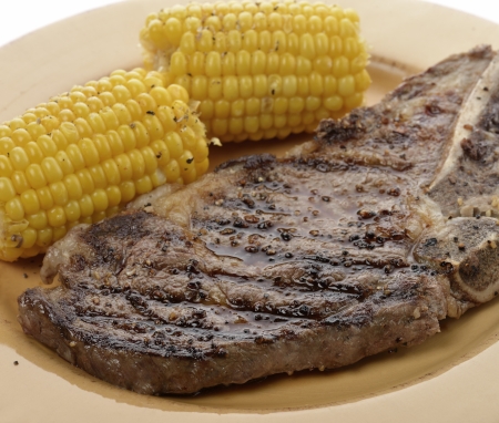 A Grilled Rib Eye Steak With Cornの写真素材