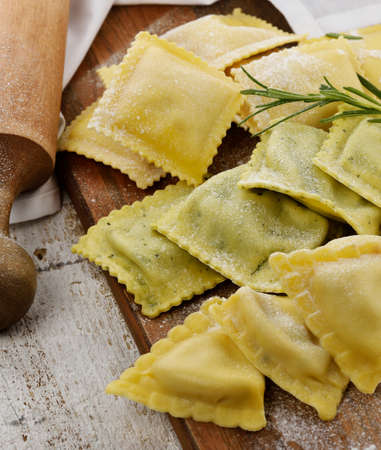 Homemade Ravioli Assortment On A Cutting Boardの写真素材
