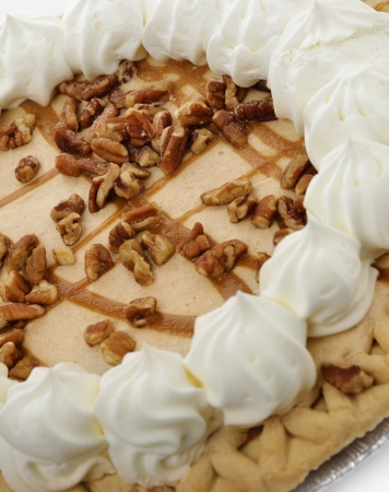 Pumpkin Pie With Whipped Cream Walnuts And Caramel Sauceの写真素材