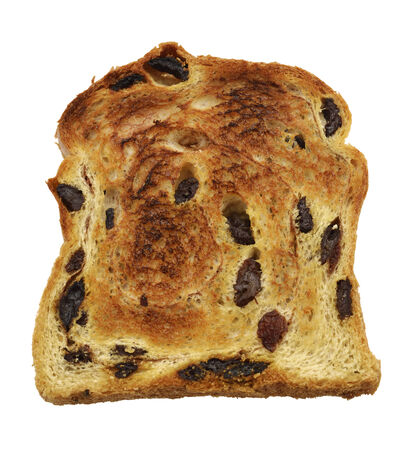 Cinnamon Swirl Raisin Bread Slice Isolated On White Backgroundの写真素材