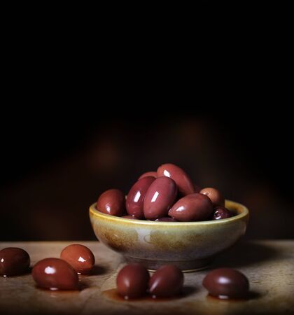 Kalamata Olives In Ceramic Bowlの写真素材