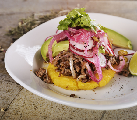 Arepas, Fried Cornmeal Patties,with Ground Beef,Avocado,Red Onions and Jalapeno